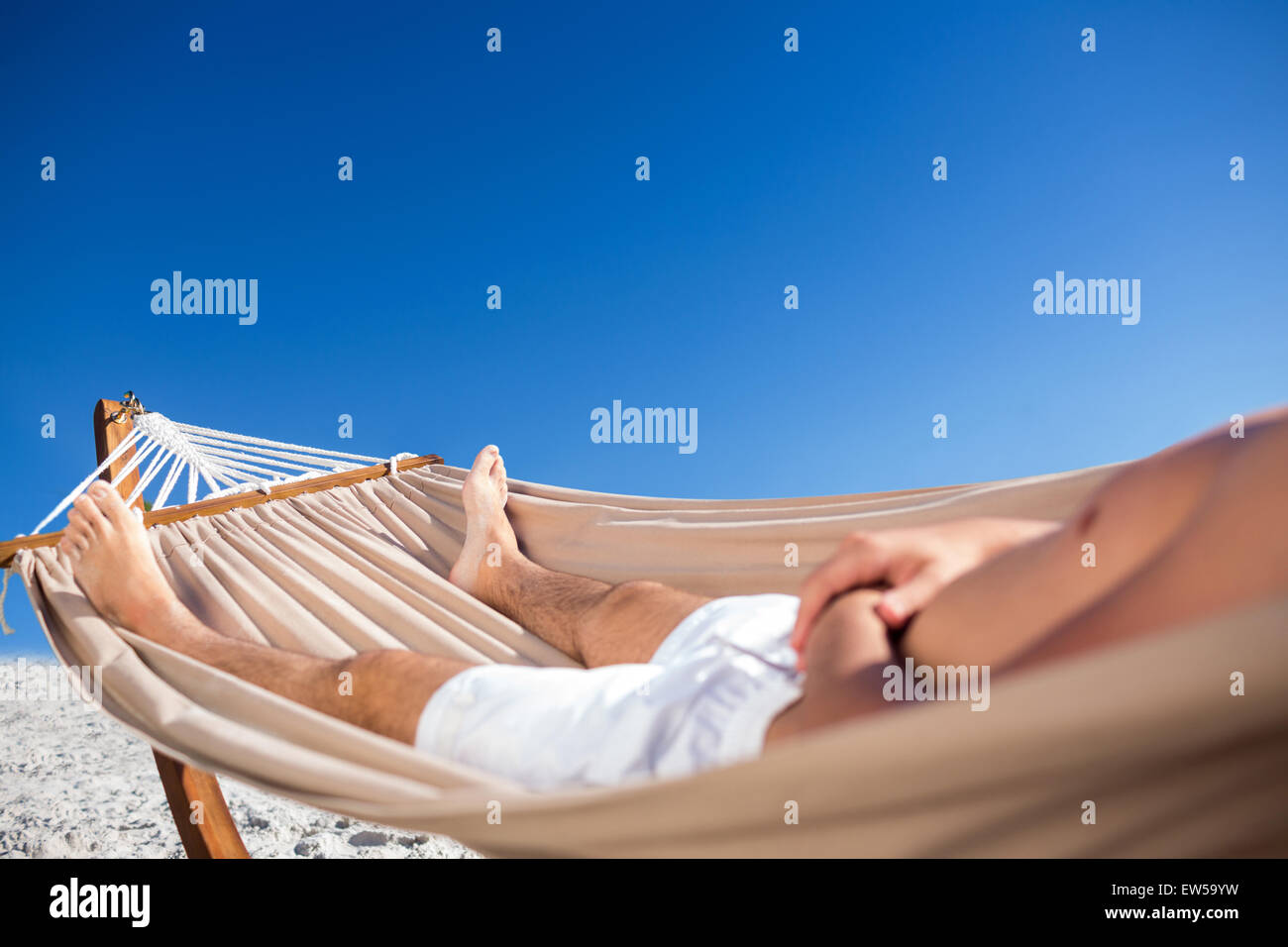 Handsome man resting in the hammock Stock Photo