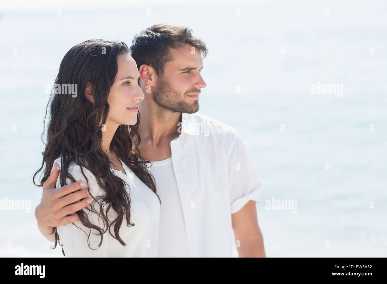 happy couple looking beyond together Stock Photo