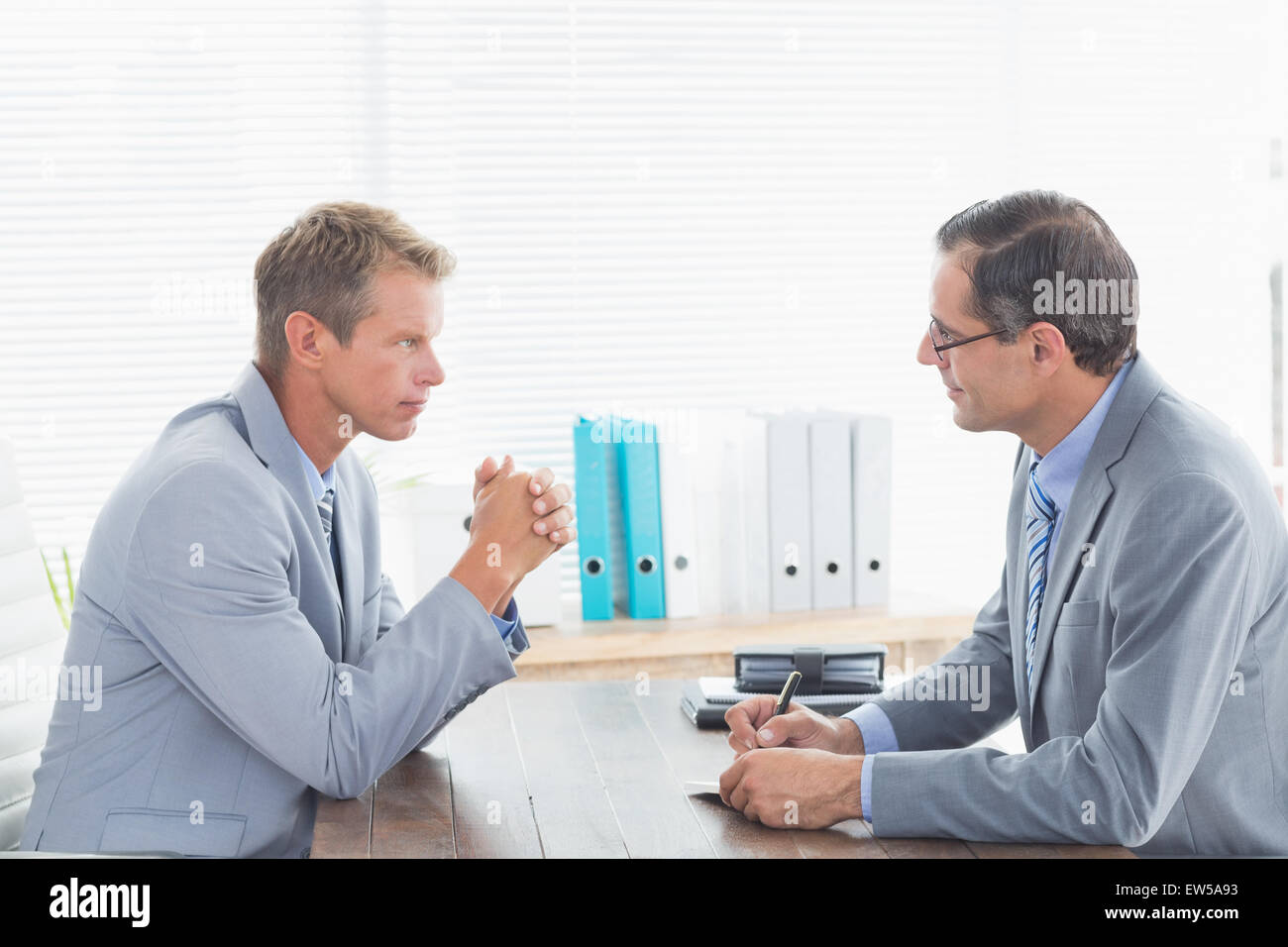 Interview Between Two Men Interview between two businessmen hi-res stock photography and images ...