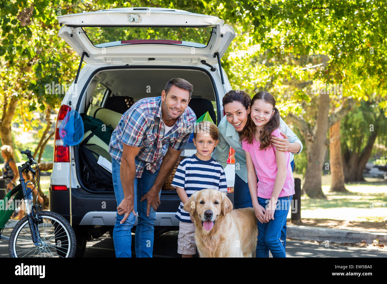 Happy family getting ready for road trip Stock Photo