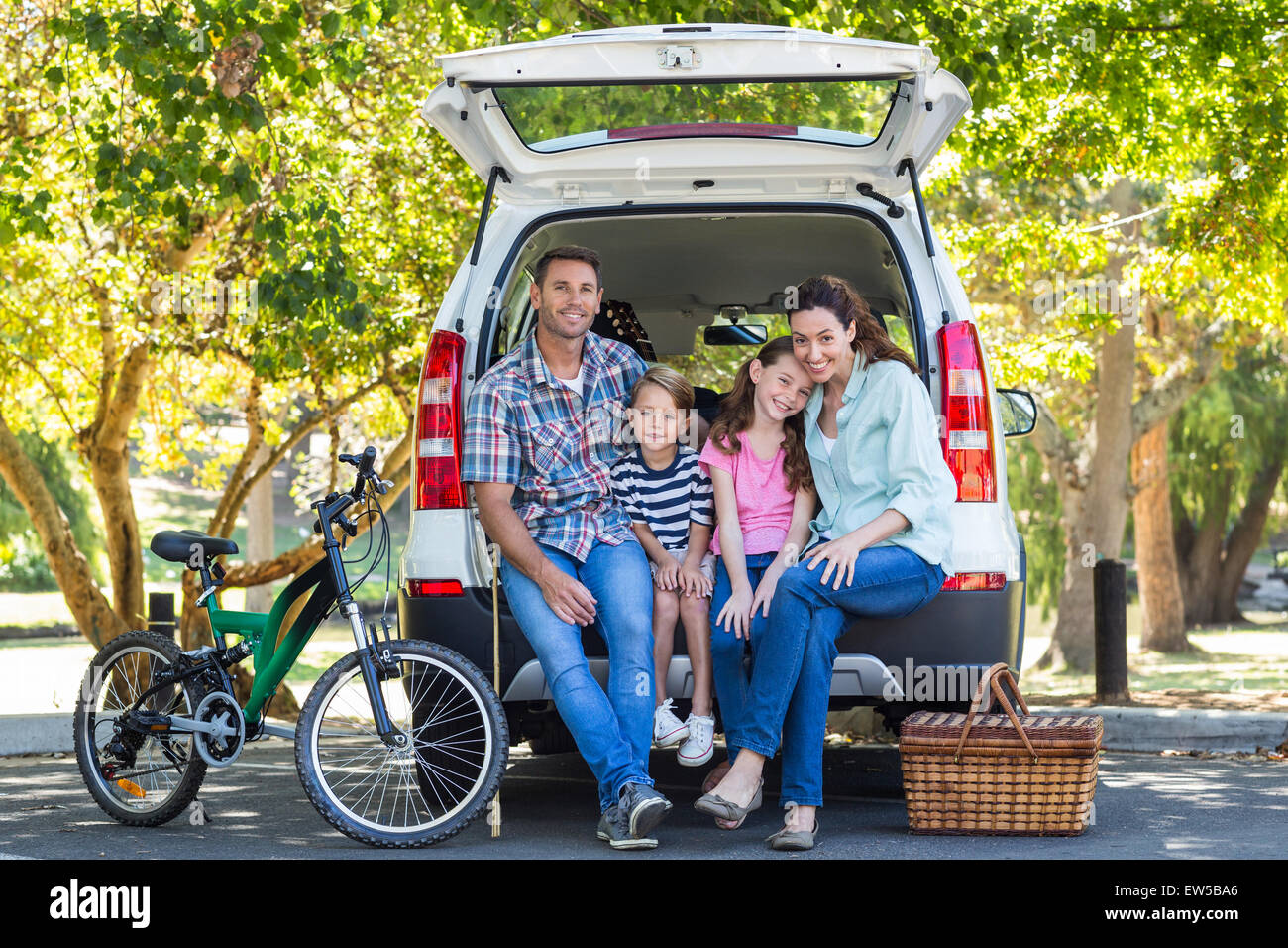 Happy family getting ready for road trip Stock Photo