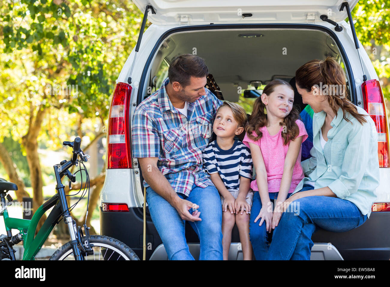 Happy family getting ready for road trip Stock Photo