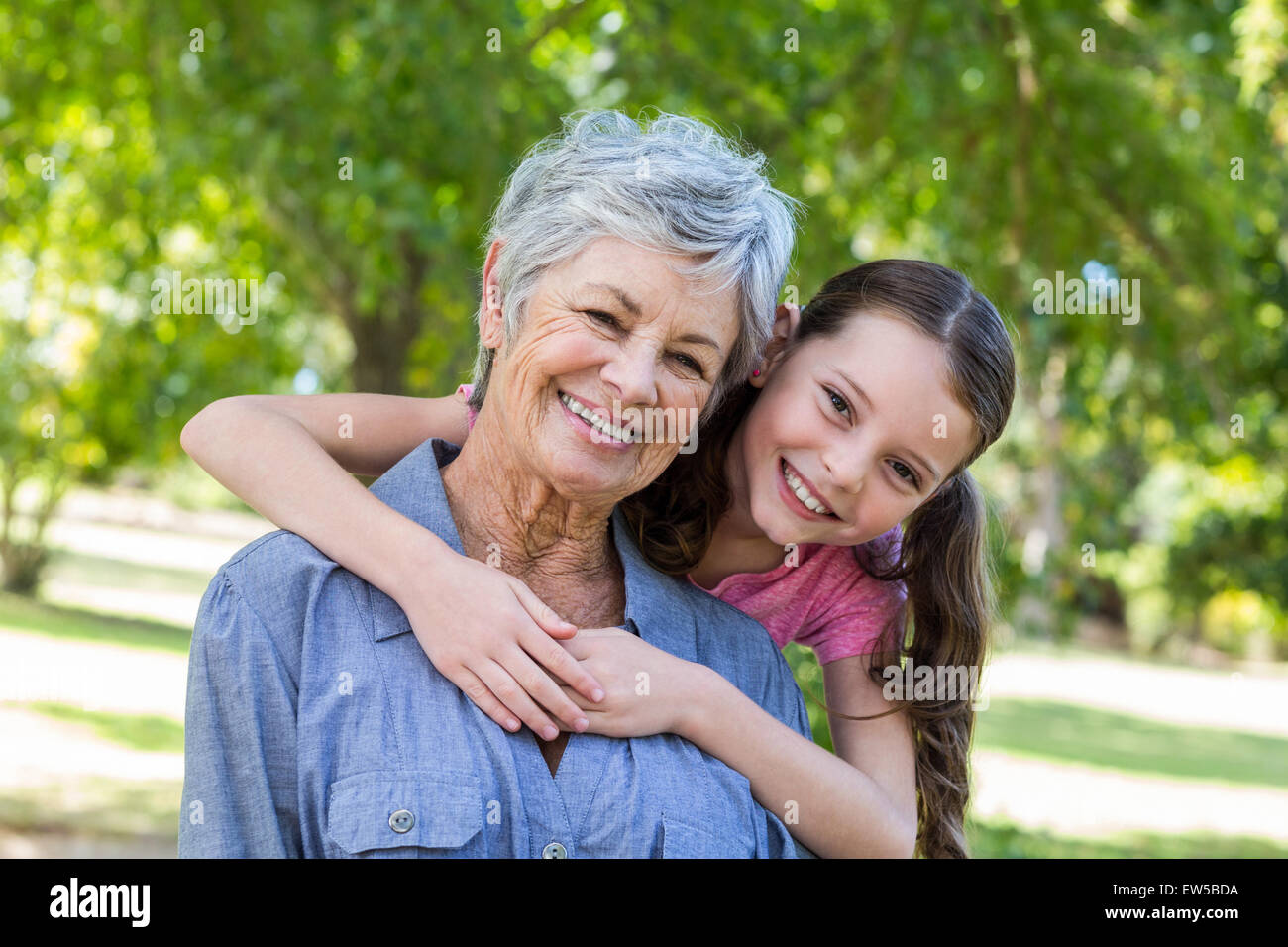 granddaughter and grandmother smilling Stock Photo