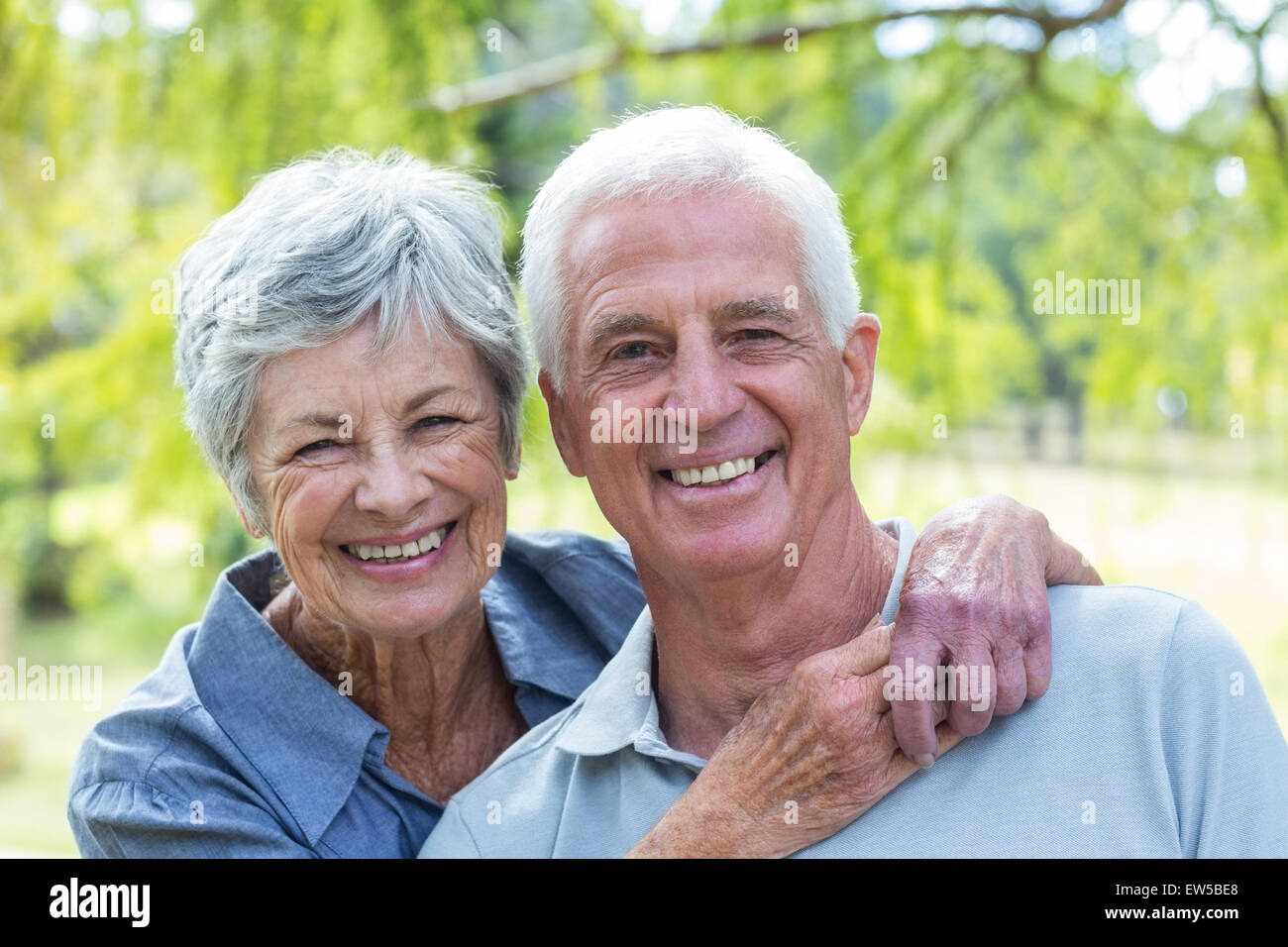 Happy old couple smiling Stock Photo - Alamy