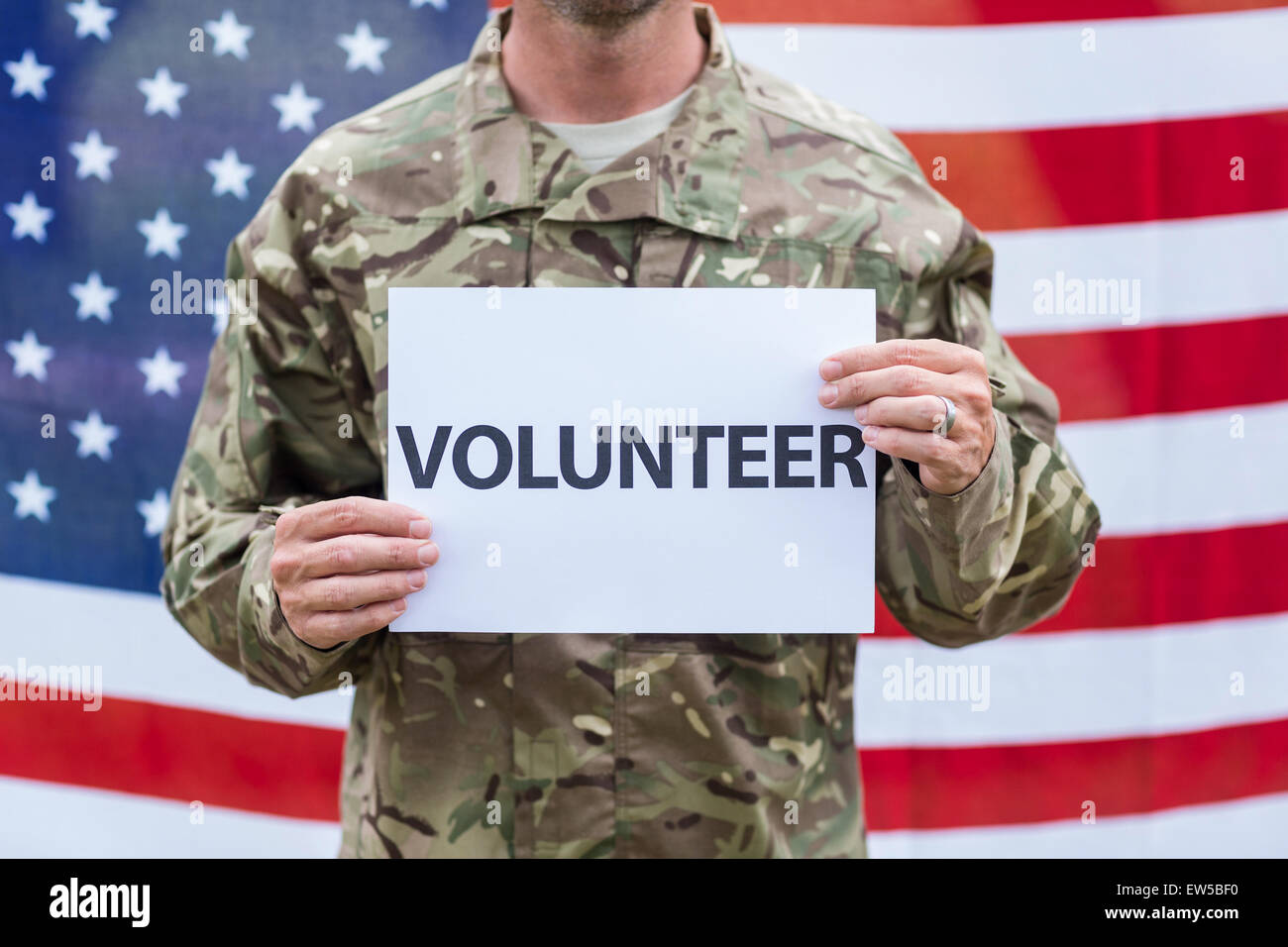 American soldier holding recruitment sign Stock Photo