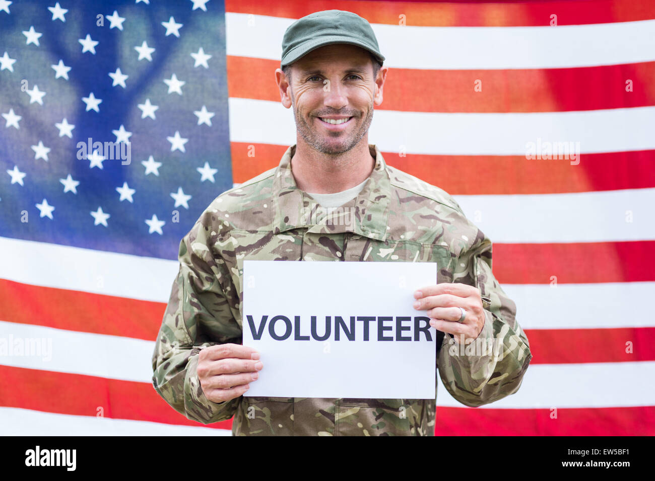 American soldier holding recruitment sign Stock Photo