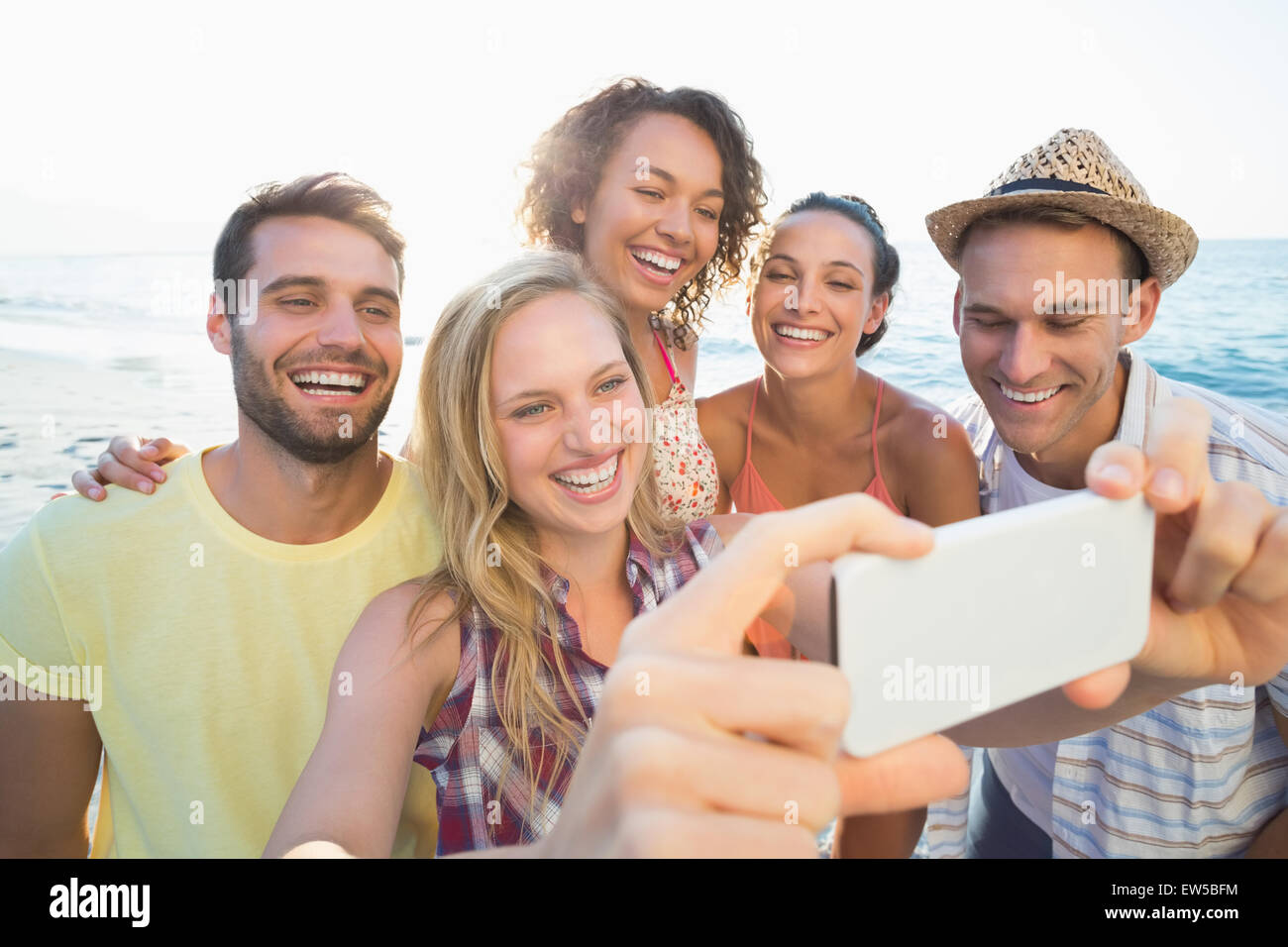 group of friends taking selfies Stock Photo