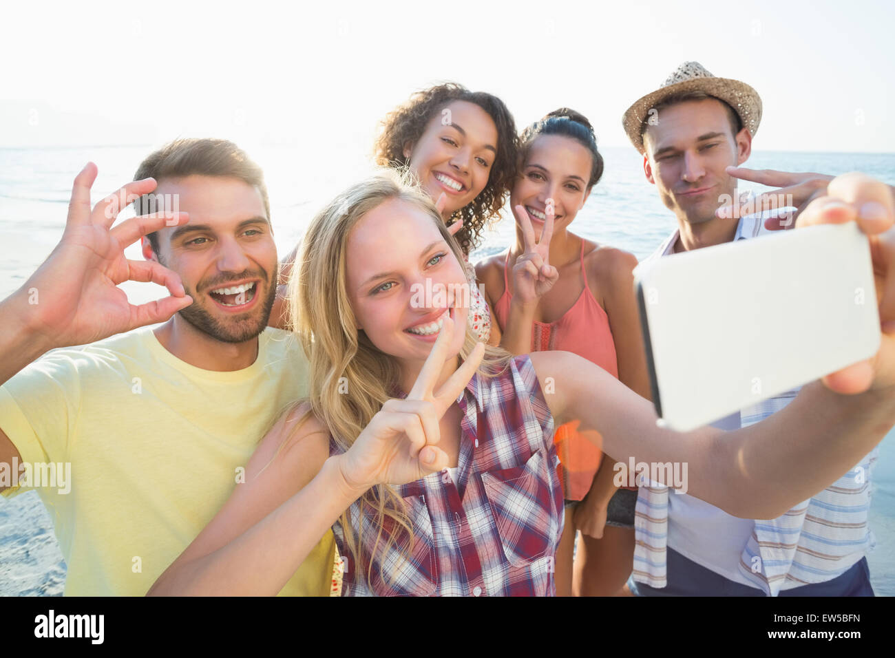 group of friends taking selfies Stock Photo