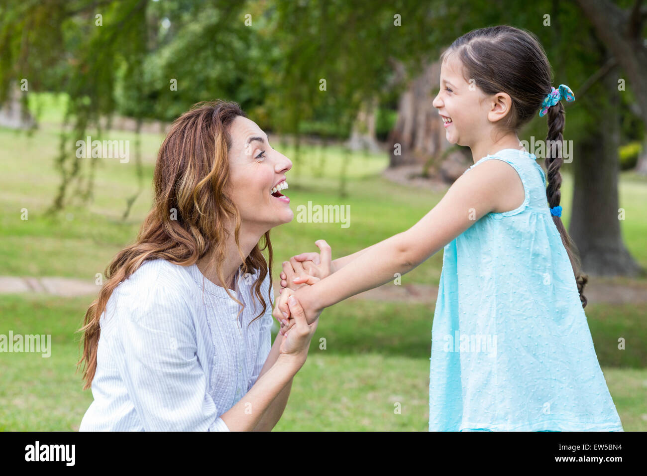Happy mother and daughter smiling Stock Photo