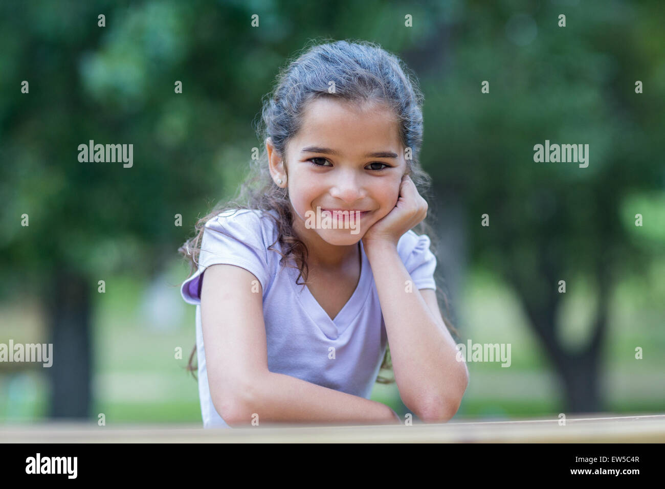 Little girl smiling at the camera Stock Photo - Alamy