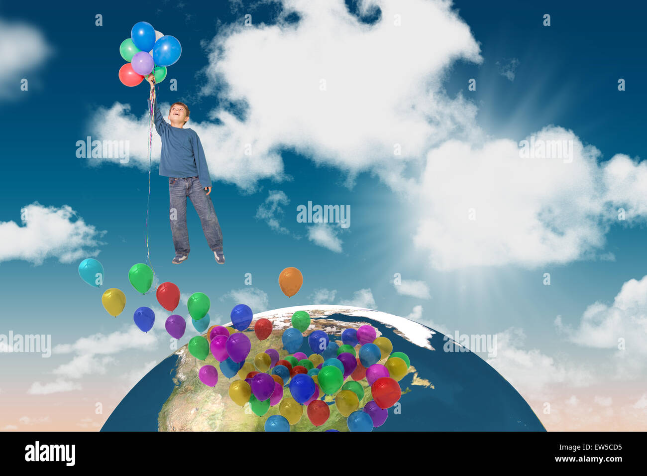 Boy floating with balloons hires stock photography and images Alamy