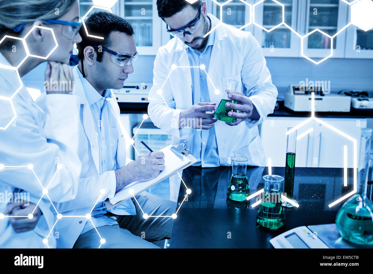Young science student looking beaker hi-res stock photography and ...