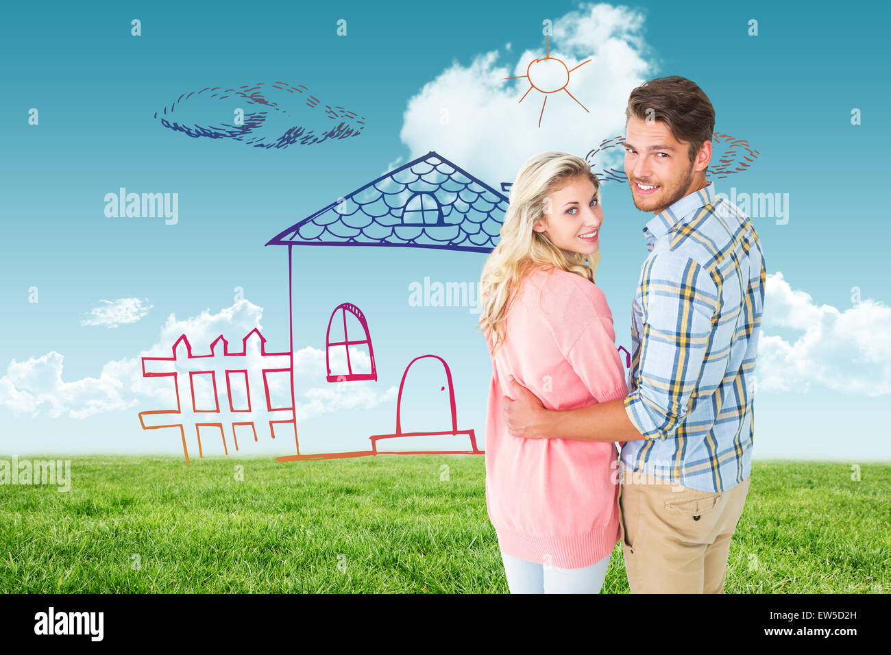 Composite image of attractive couple turning and smiling at camera Stock Photo