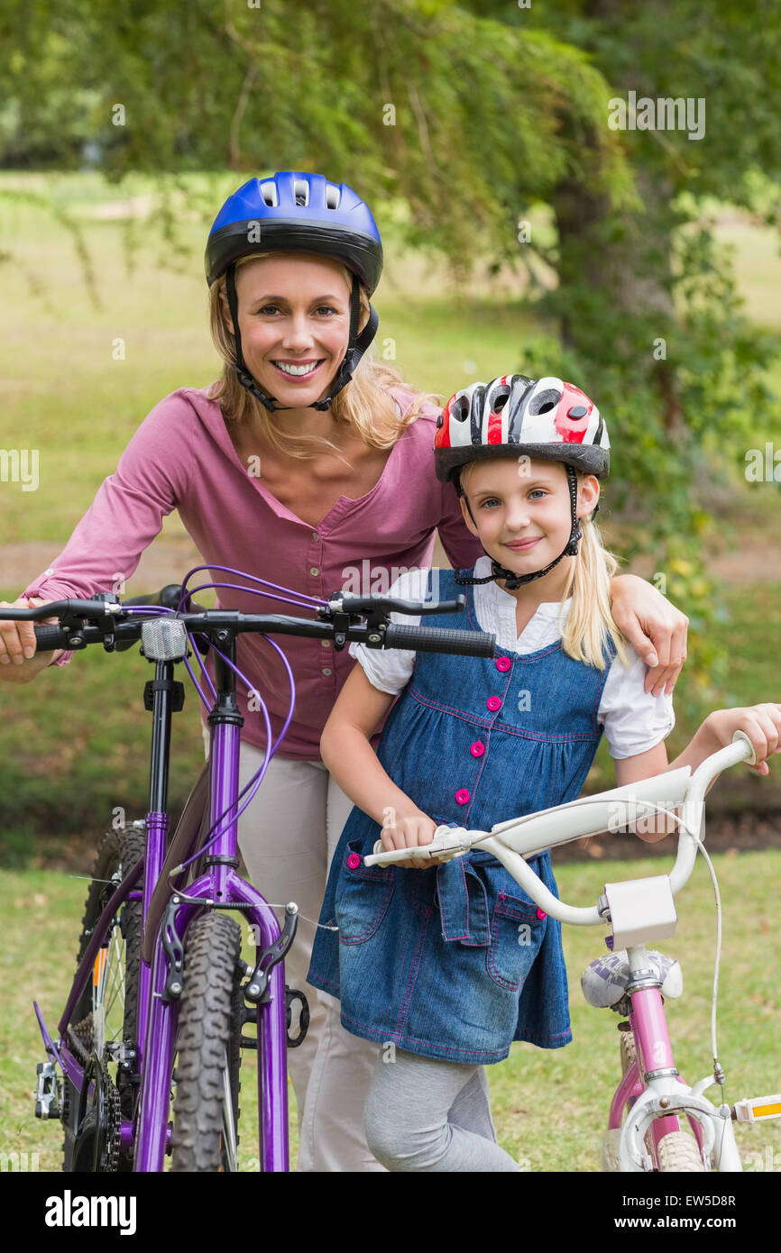 Mother with child cycling hi res stock photography and images Page 4 Alamy