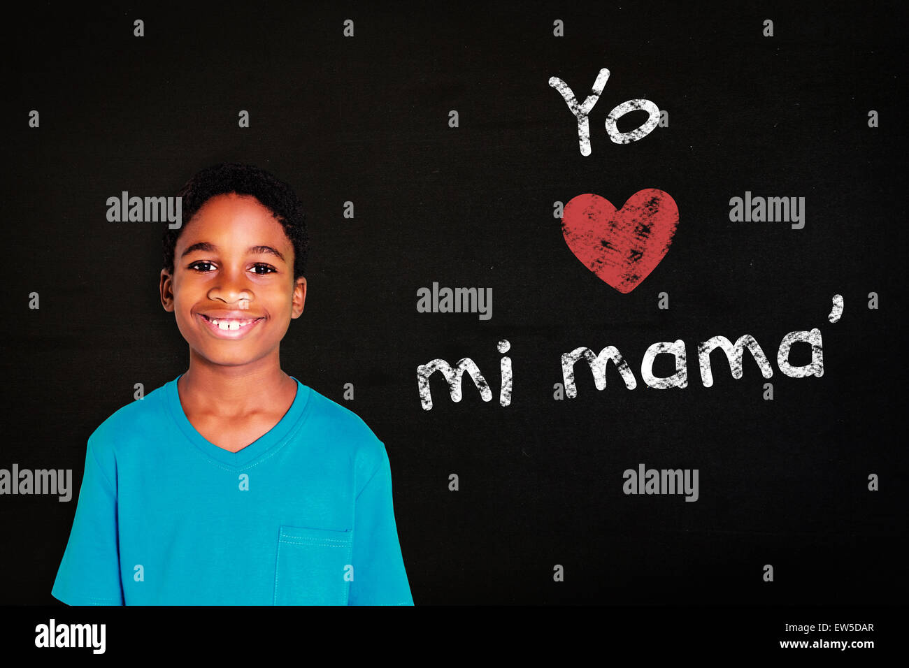 Composite image of cute boy smiling at camera Stock Photo - Alamy
