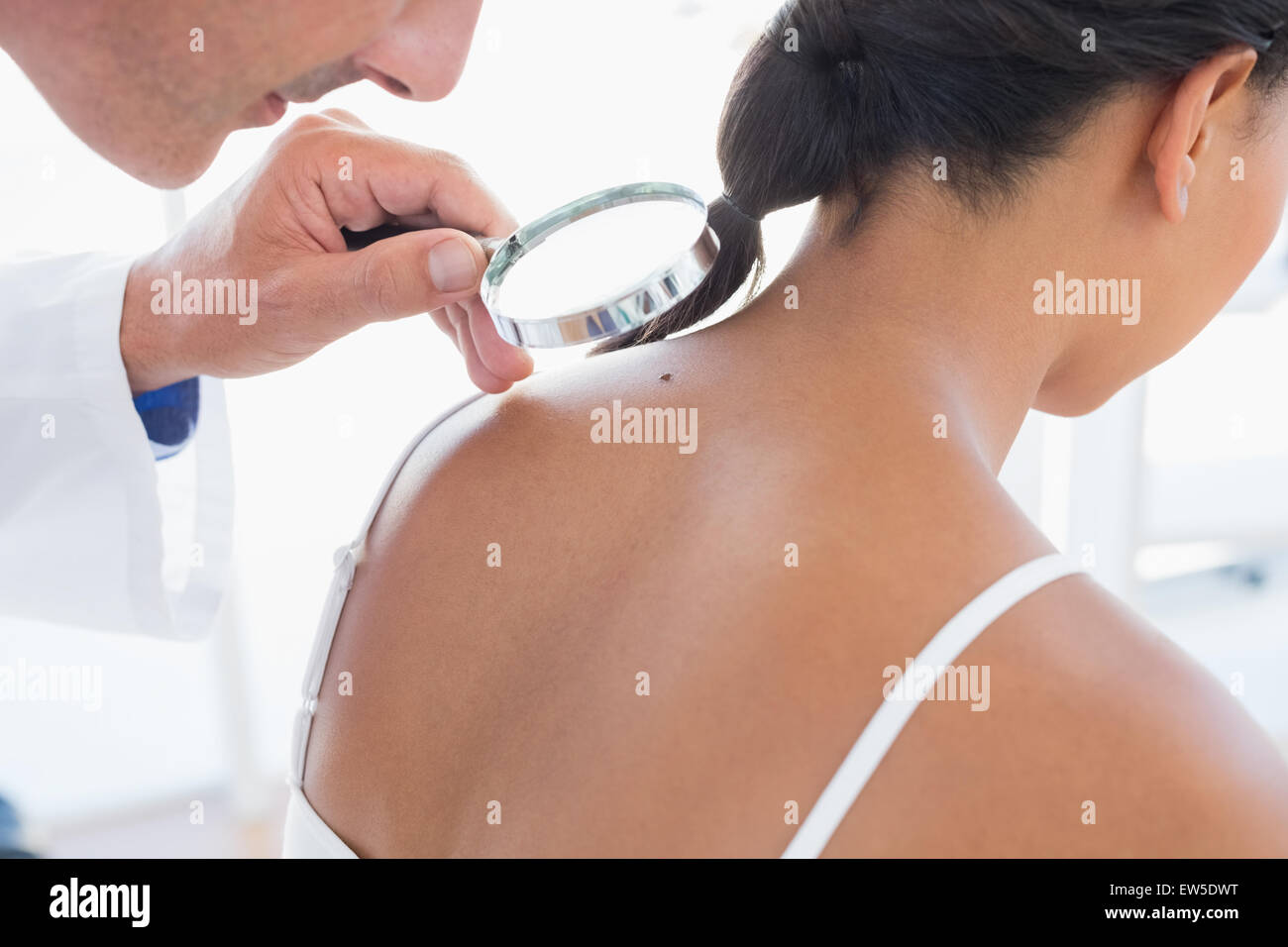 Doctor visiting patient in hospital Stock Photo