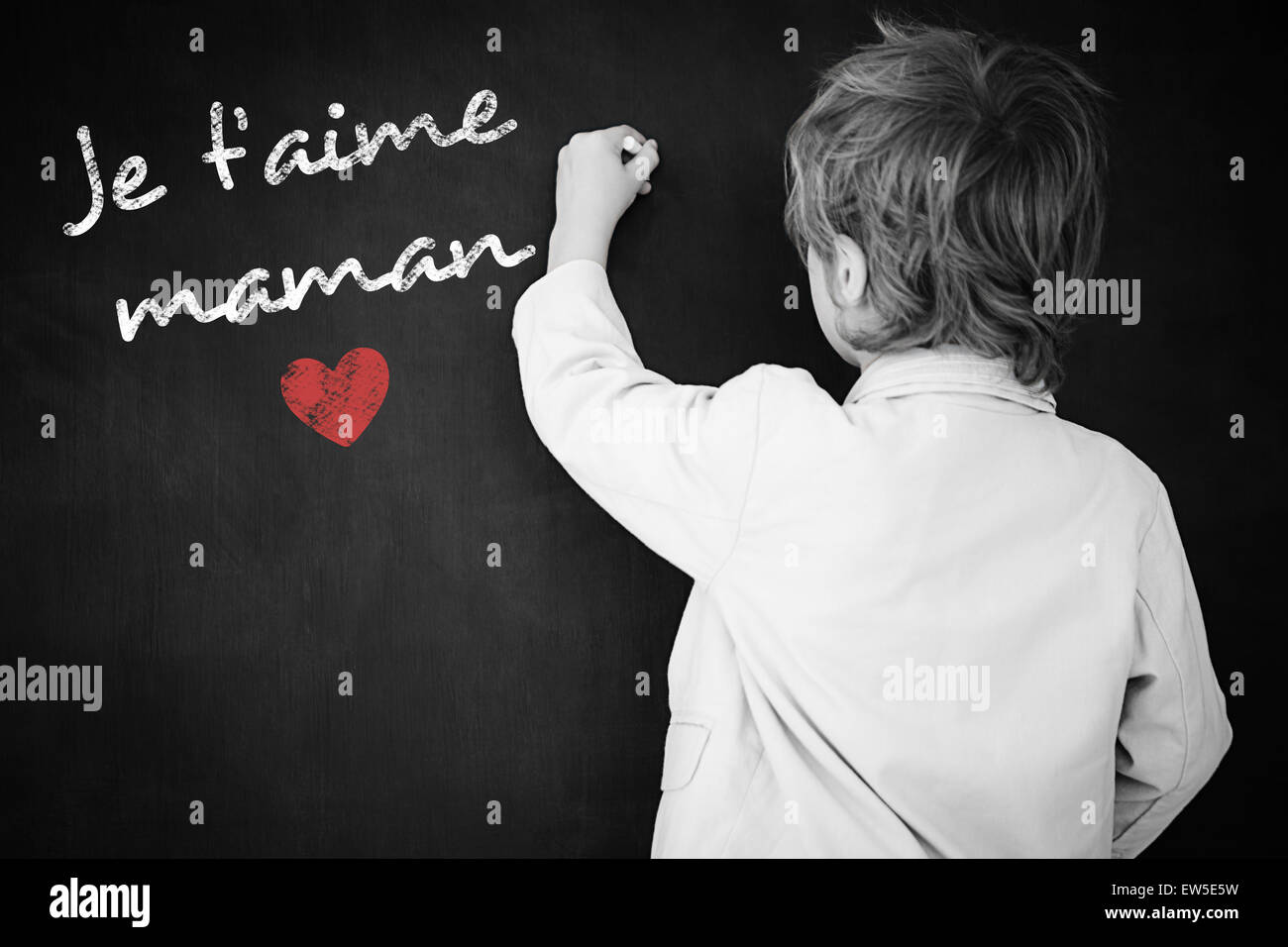 Composite image of schoolchild with blackboard Stock Photo