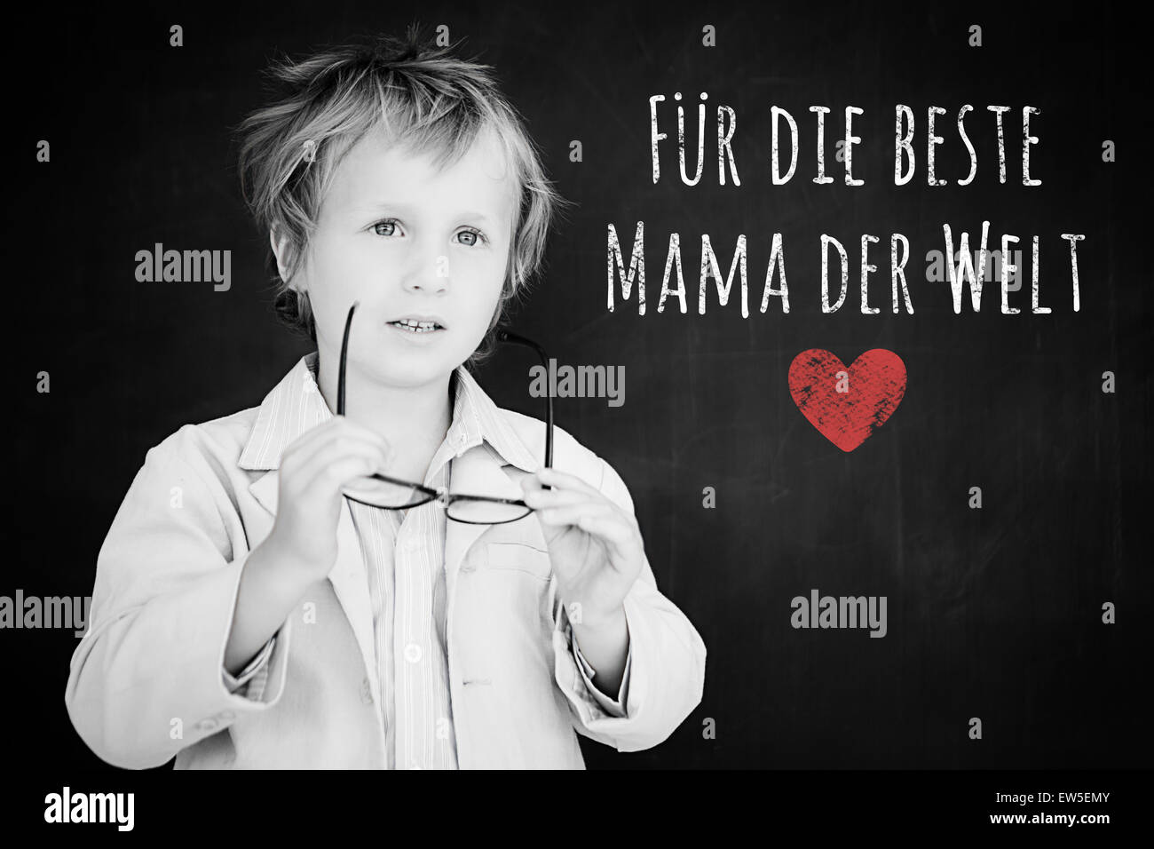 Composite image of schoolchild with blackboard Stock Photo