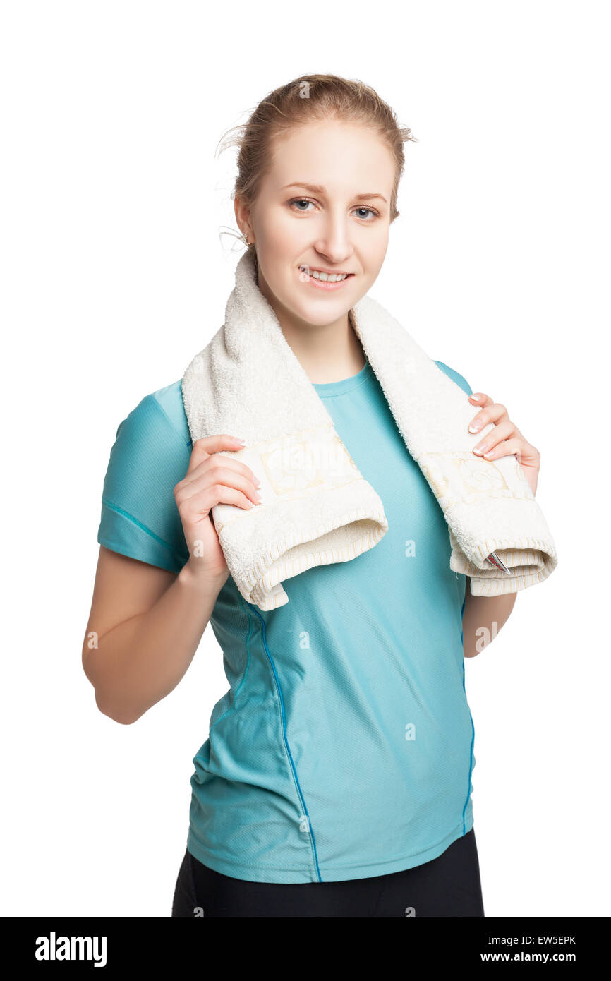 Smiling happy female fitness model with a towel looking at camera Stock ...