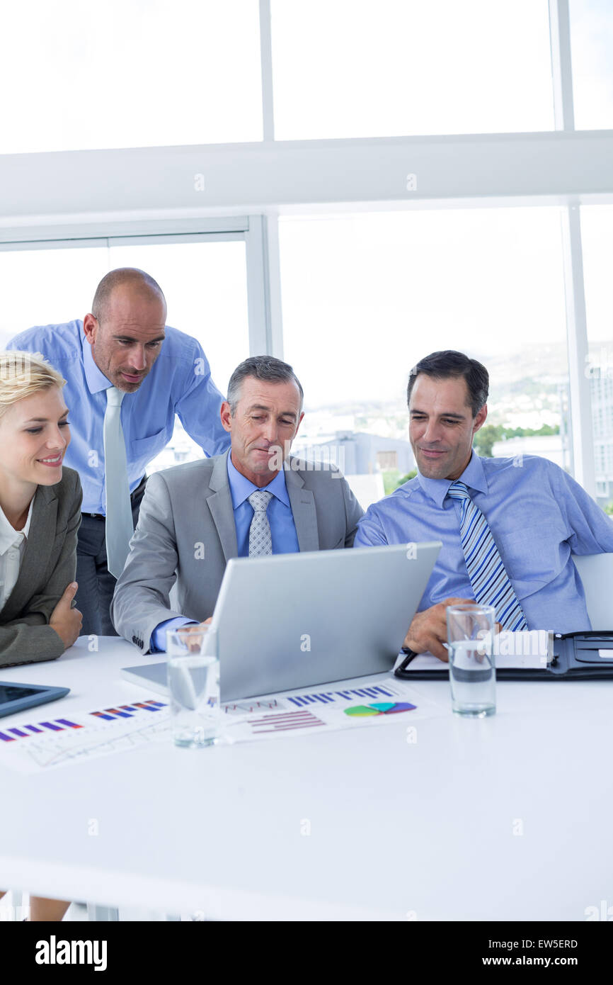 Business team working together on laptop Stock Photo - Alamy