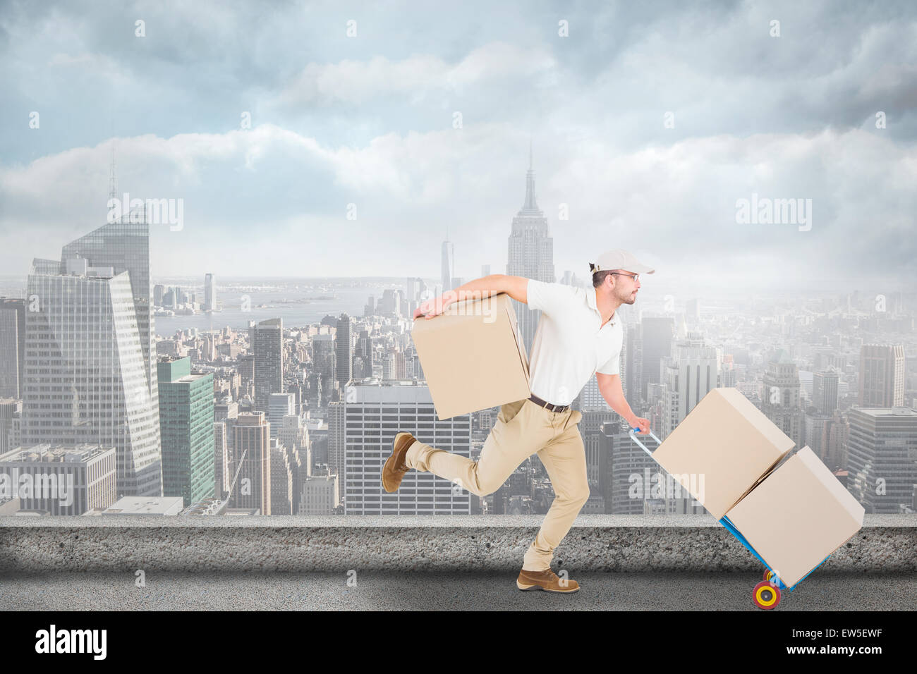 Composite image of delivery man with trolley of boxes running Stock ...