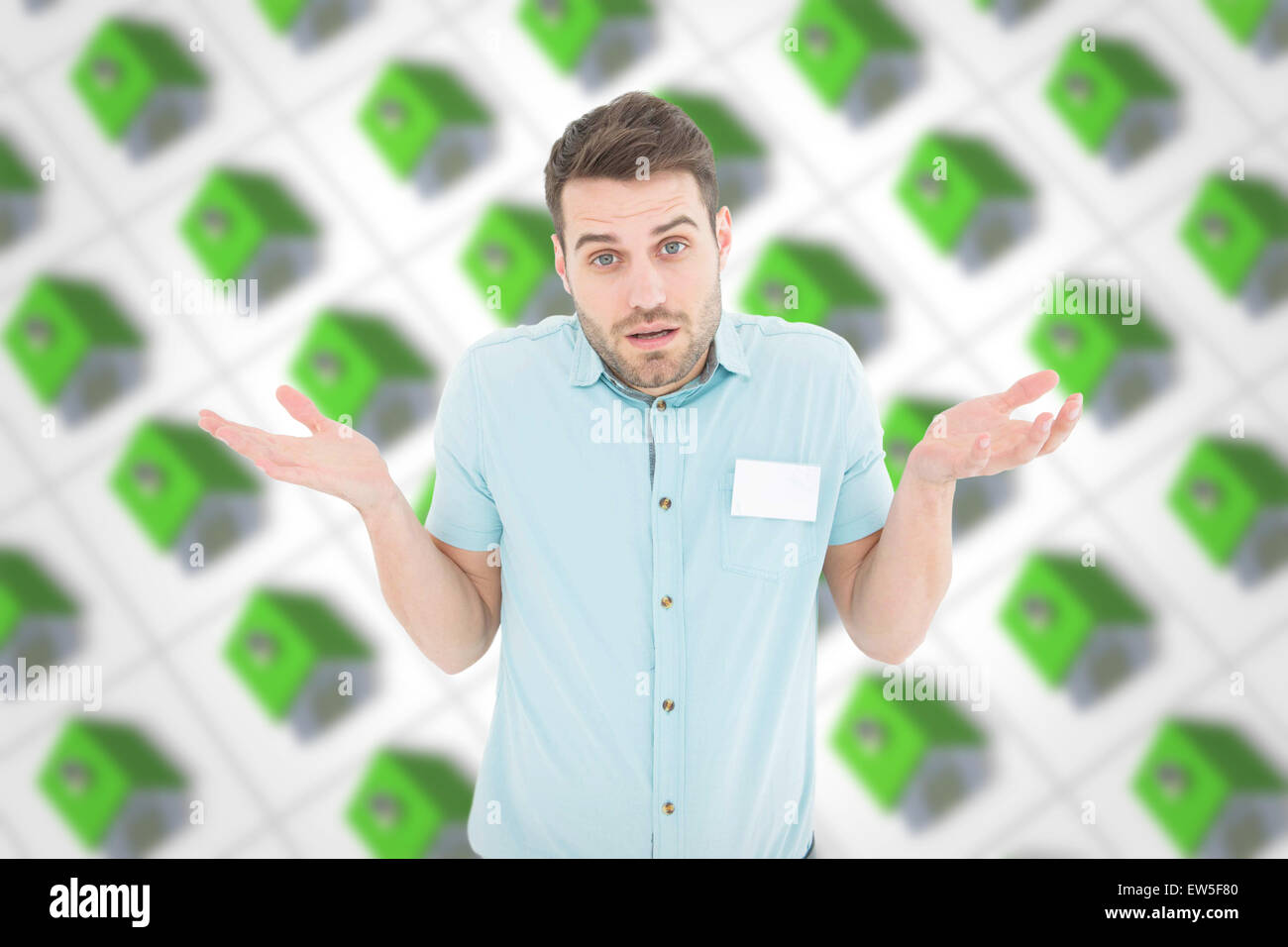 Composite image of delivery man giving i dont know gesture Stock Photo