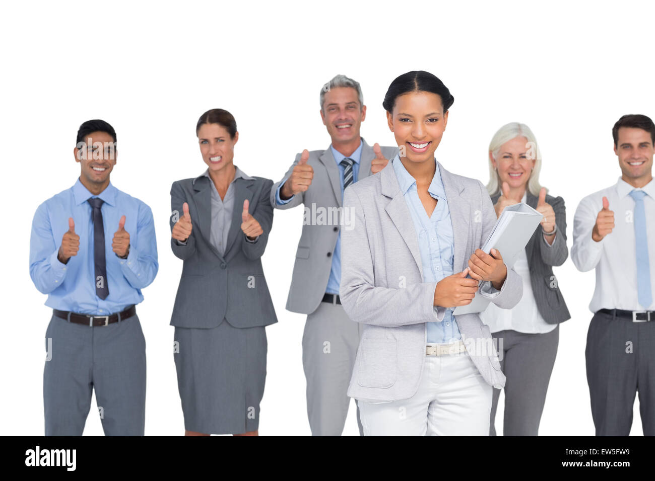 Happy business people looking at camera with thumbs up Stock Photo - Alamy