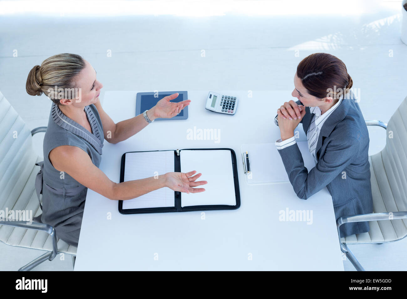 Businesswomen working together Stock Photo - Alamy