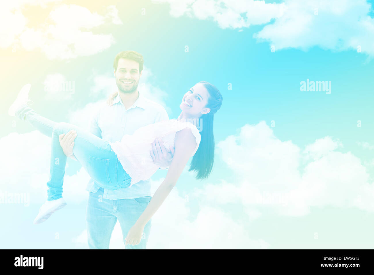 Composite image of attractive young couple having fun Stock Photo - Alamy