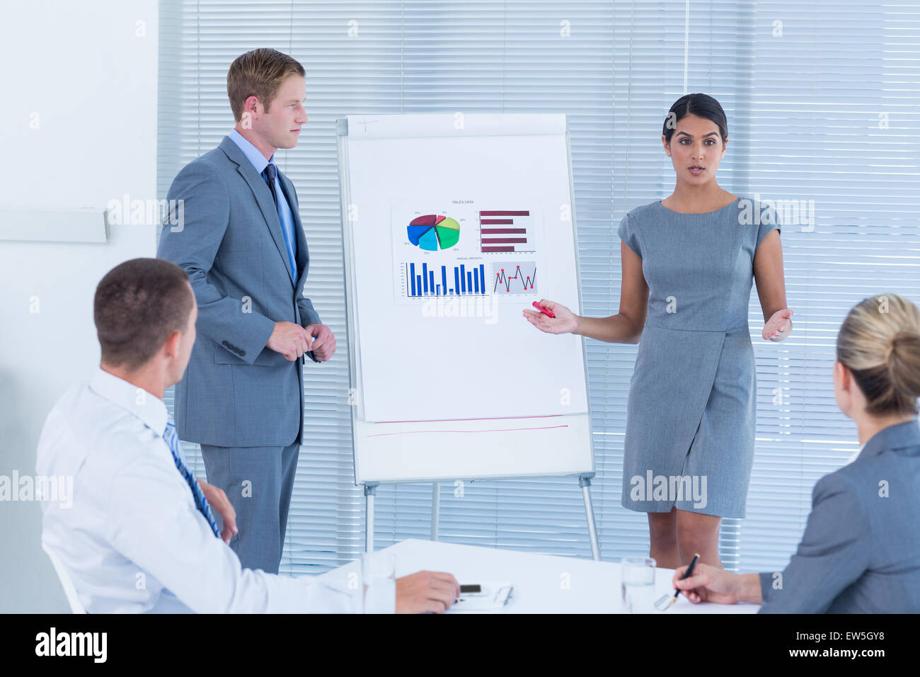 Business people doing statistics presentation Stock Photo