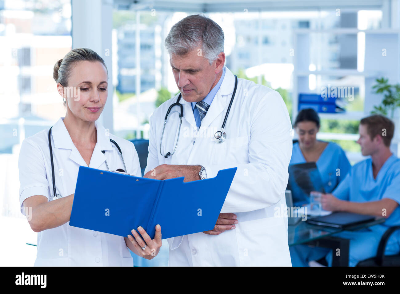 Male doctors working table hi-res stock photography and images - Alamy