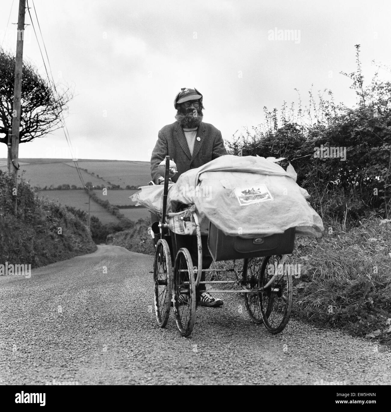 Gentleman of the road George Gibb seen here with his battered pram tramping the roads around the Welsh town of Capel 14th October 1973 Stock Photo