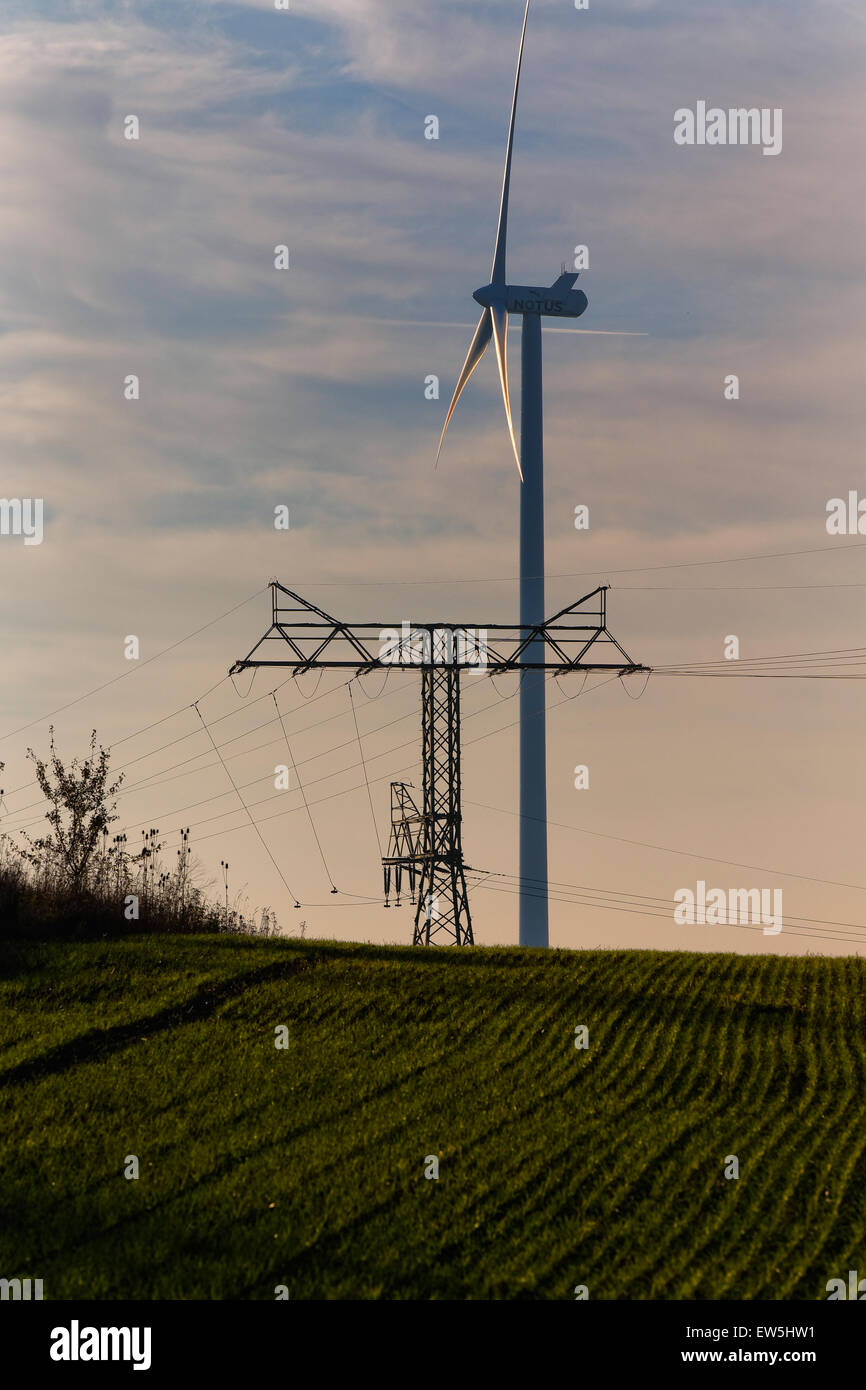 Klein-Mutz, Germany, wind turbine and Pylon of power line Stock Photo