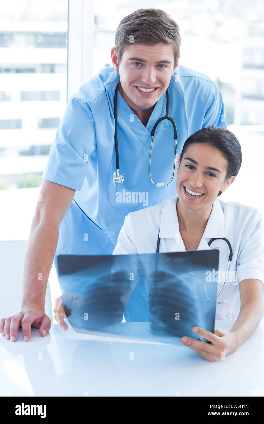 Team of doctors analyzing xray Stock Photo - Alamy
