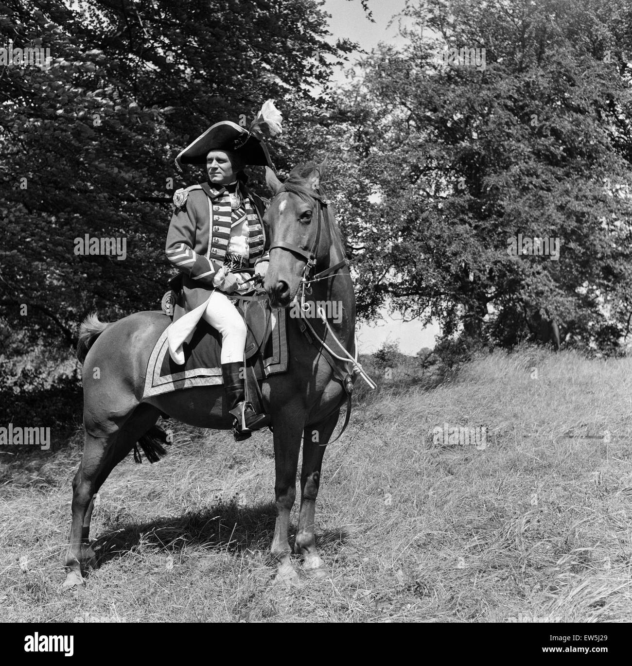 Laurence Olivier on the set of 'The Devil's Disciple' in Tring Park, Hertfordshire. 30th July 1958. Stock Photo