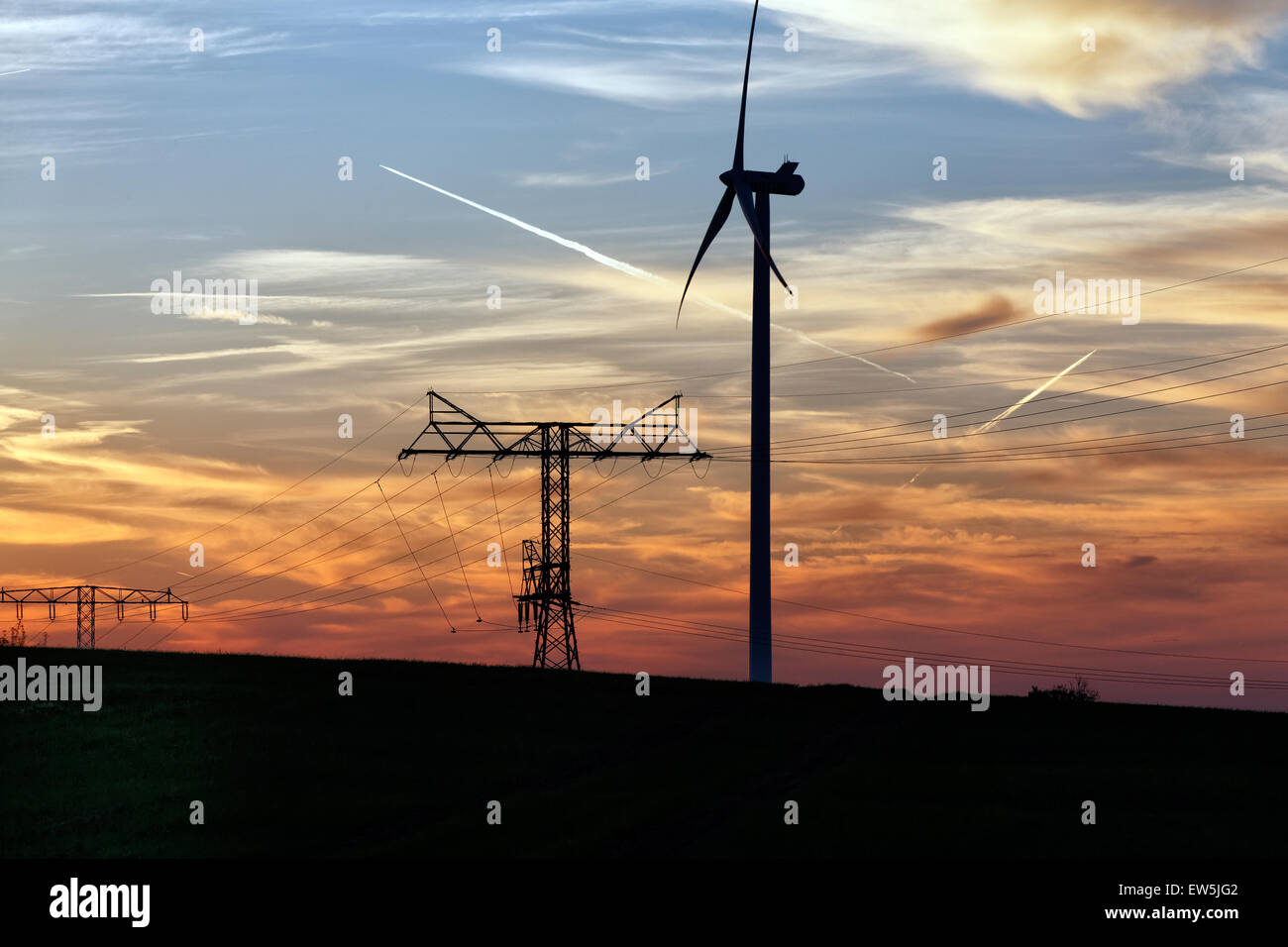 Klein-Mutz, Germany, wind turbine and Pylon of power line Stock Photo