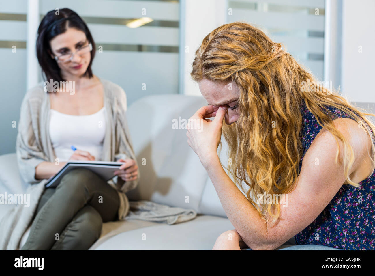 Psychologist talking with her depressed patient Stock Photo Alamy