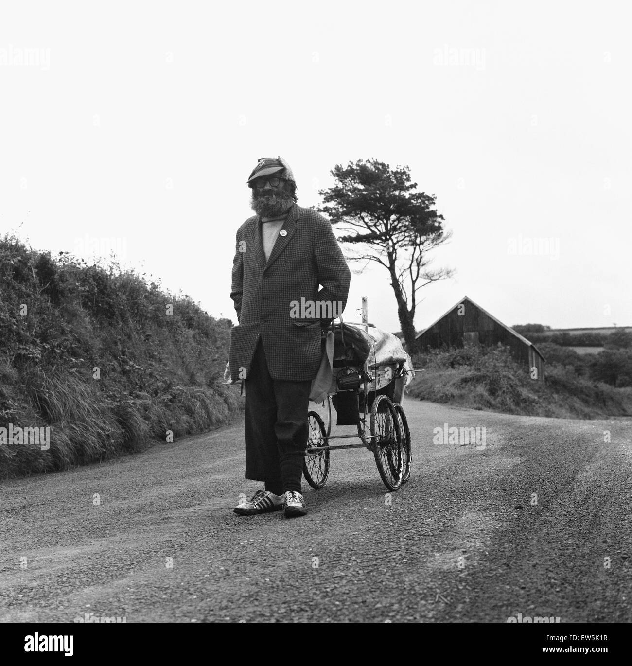 Gentleman of the road George Gibb seen here with his battered pram tramping the roads around the Welsh town of Capel 14th October 1973 Stock Photo