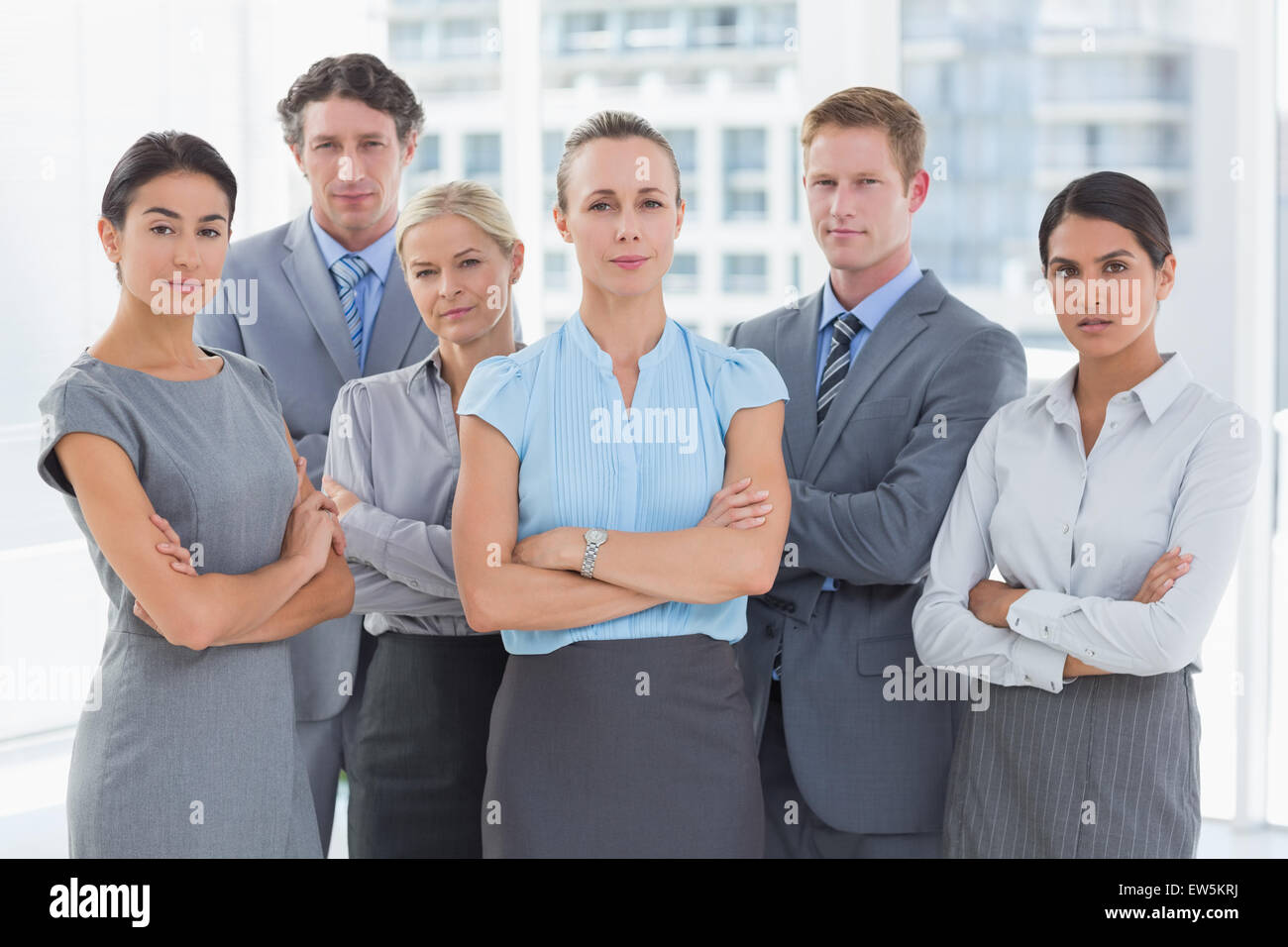 Business team smiling at camera Stock Photo - Alamy