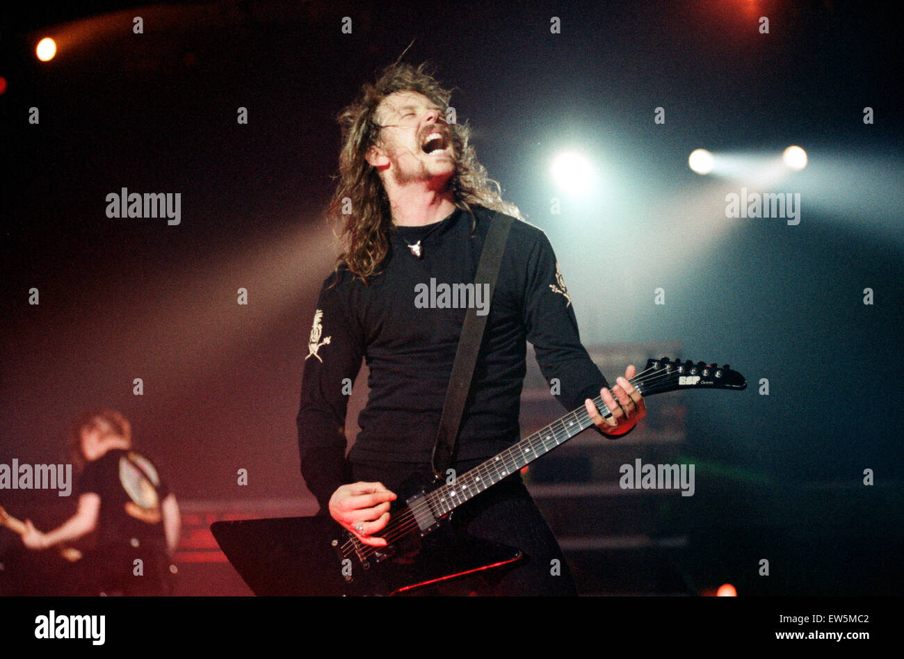 Metallica in concert at the NEC Arena, Birmingham. James Hetfield, lead singer and guitarist with the band. 4th November 1992. Stock Photo