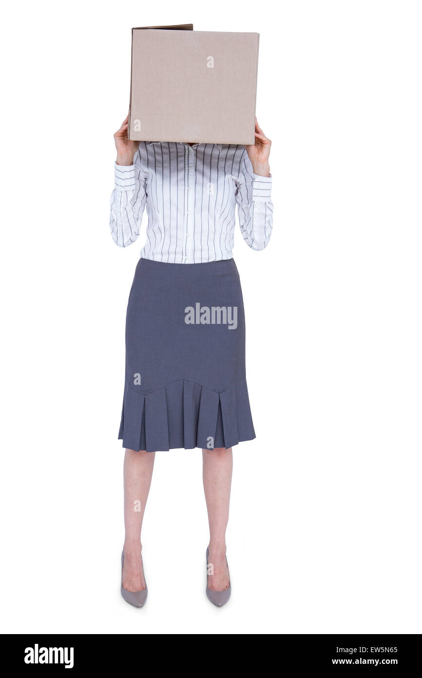 Businesswoman with box over head Stock Photo