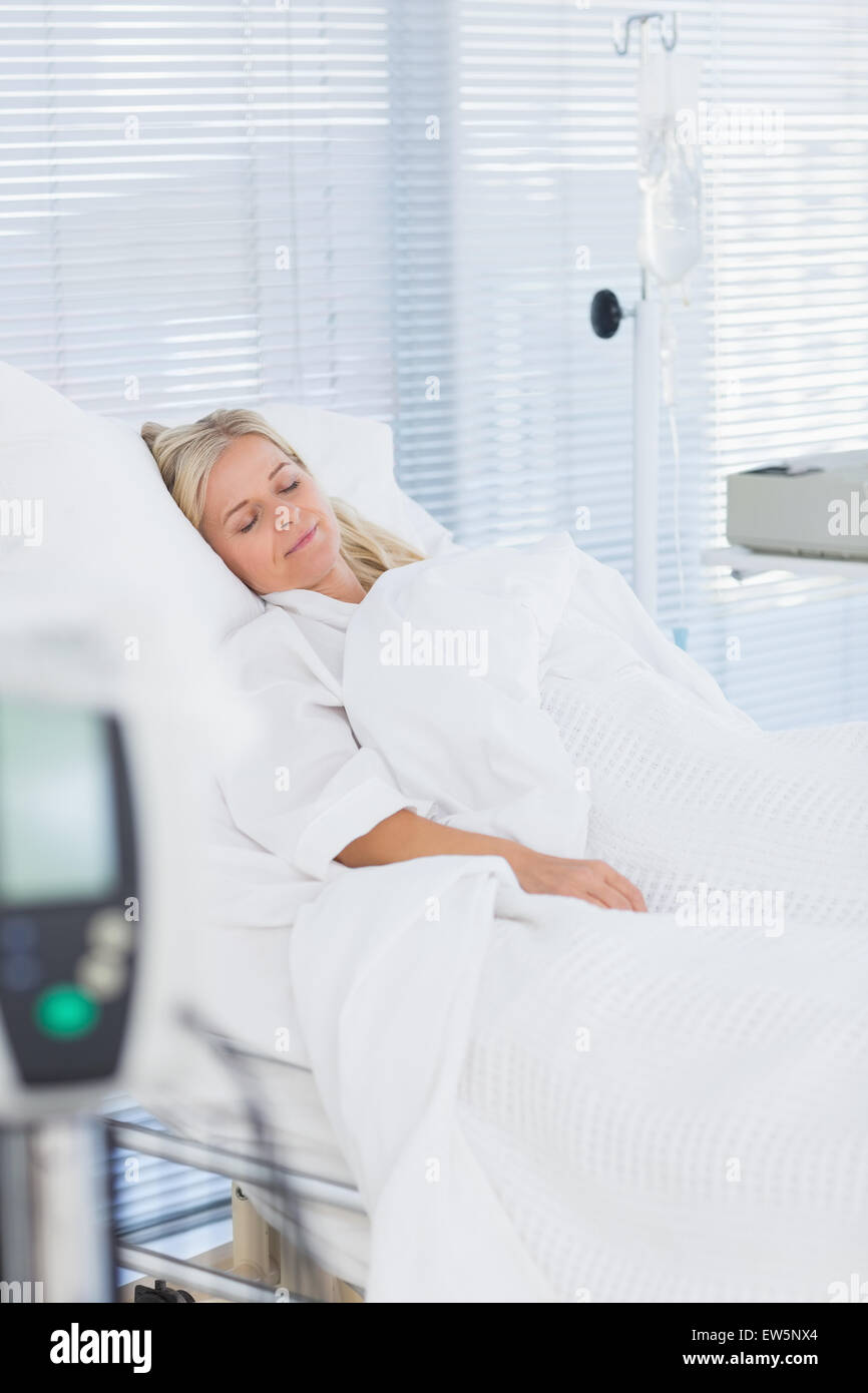 Happy patient lying on bed hi-res stock photography and images - Alamy