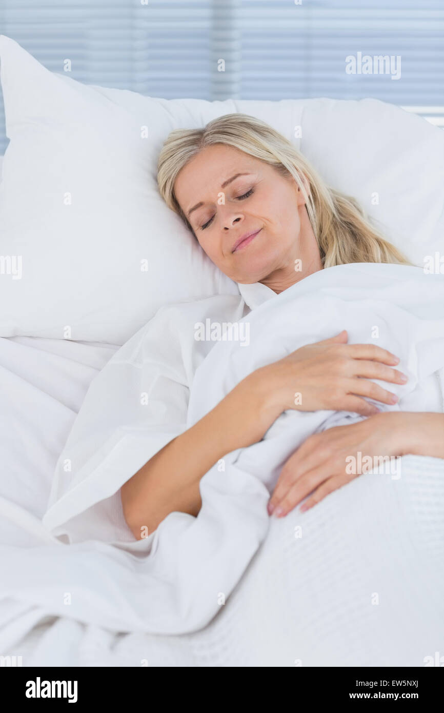 Happy patient lying on bed hi-res stock photography and images - Alamy