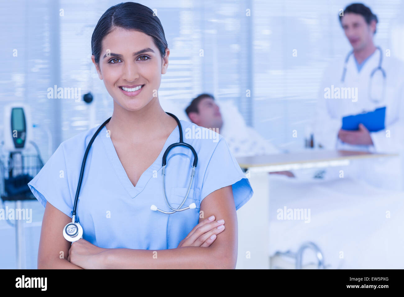 Smiling doctor looking at camera Stock Photo - Alamy