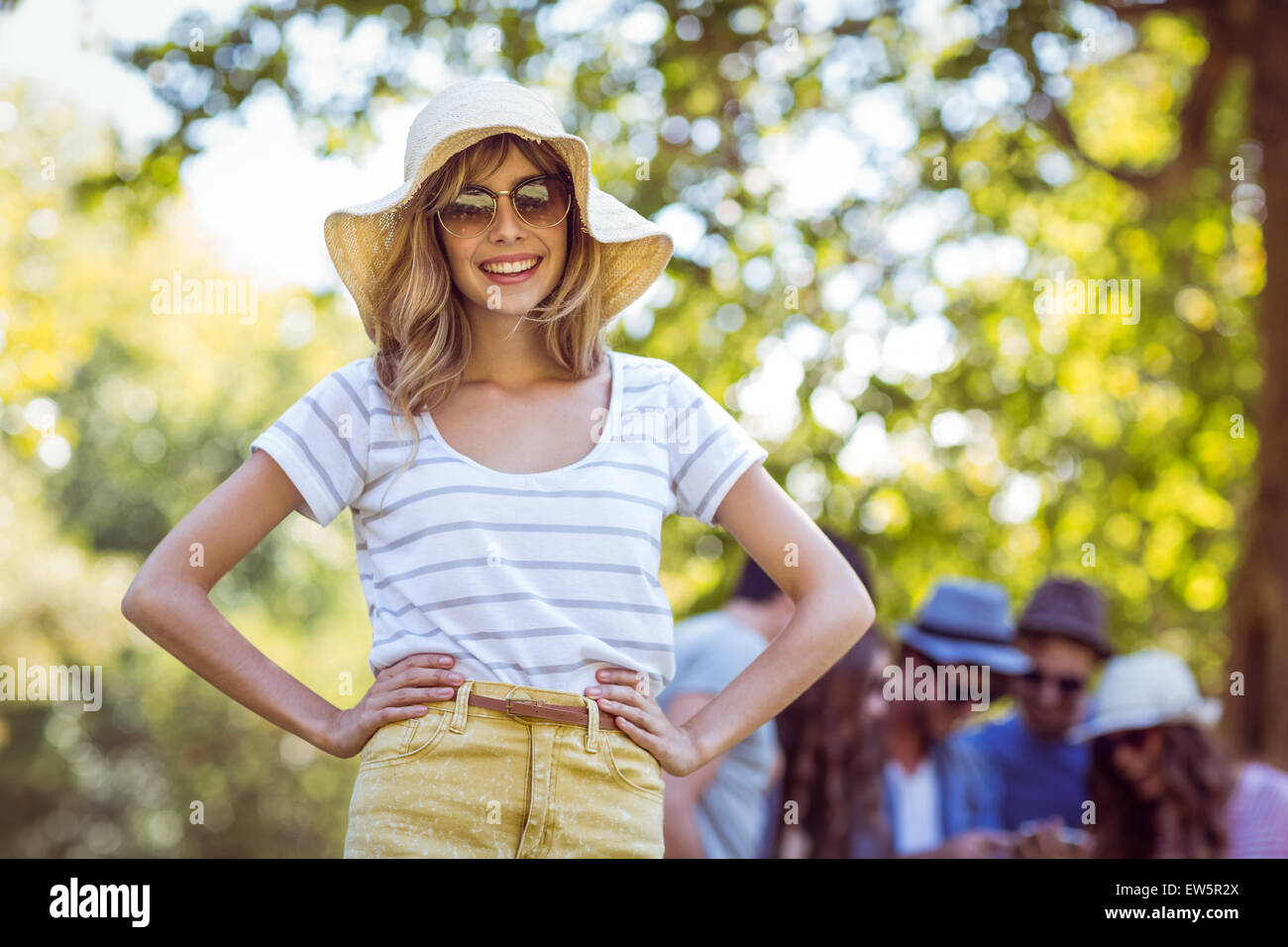 Happy friends in the park Stock Photo - Alamy
