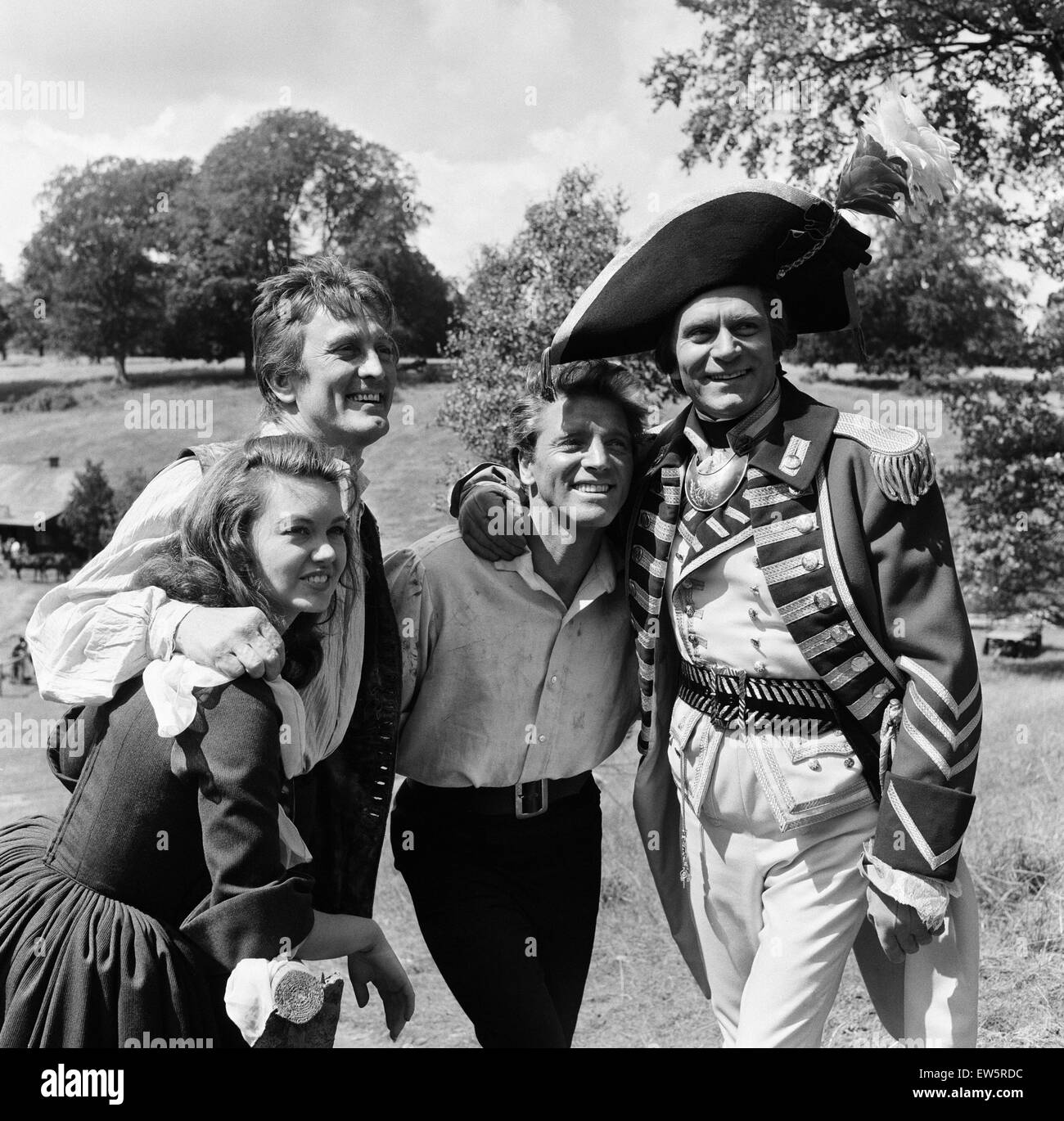 Janette Scott, Kirk Douglas, Burt Lancaster and Laurence Olivier on the set of 'The Devil's Disciple' in Tring Park, Hertfordshire. 30th July 1958. Stock Photo