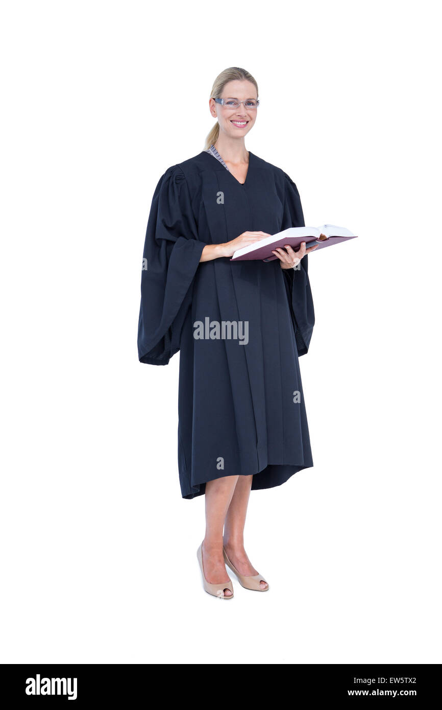 Happy pretty lawyer holding labor code Stock Photo
