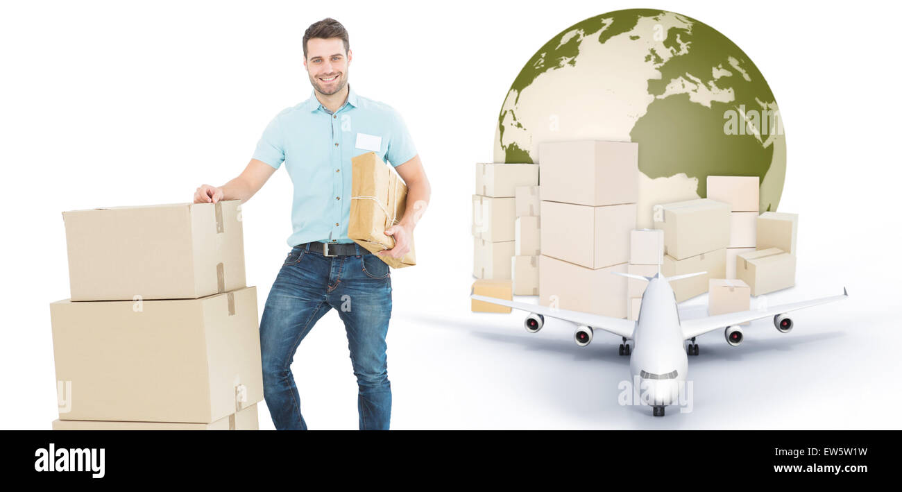 Composite image of courier man with cardboard boxes Stock Photo