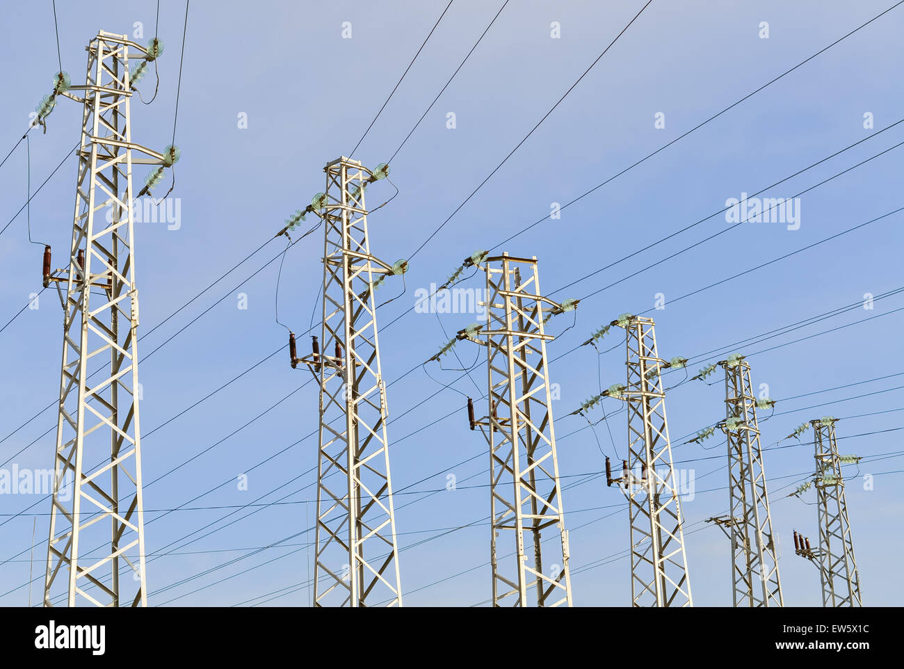 Six steel high-voltage transmission lines and clear blue sky Stock ...