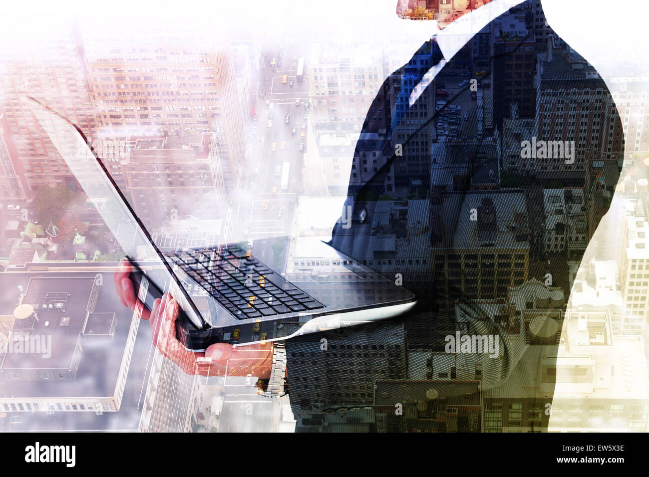 Composite image of businessman with watch using tablet pc Stock Photo
